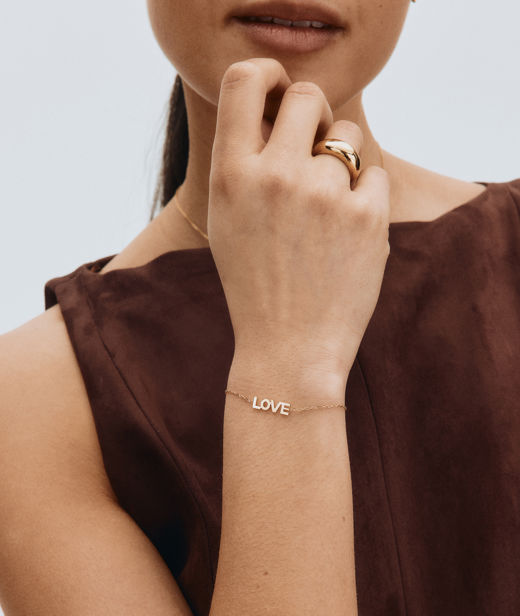 Stålarmband Love gold